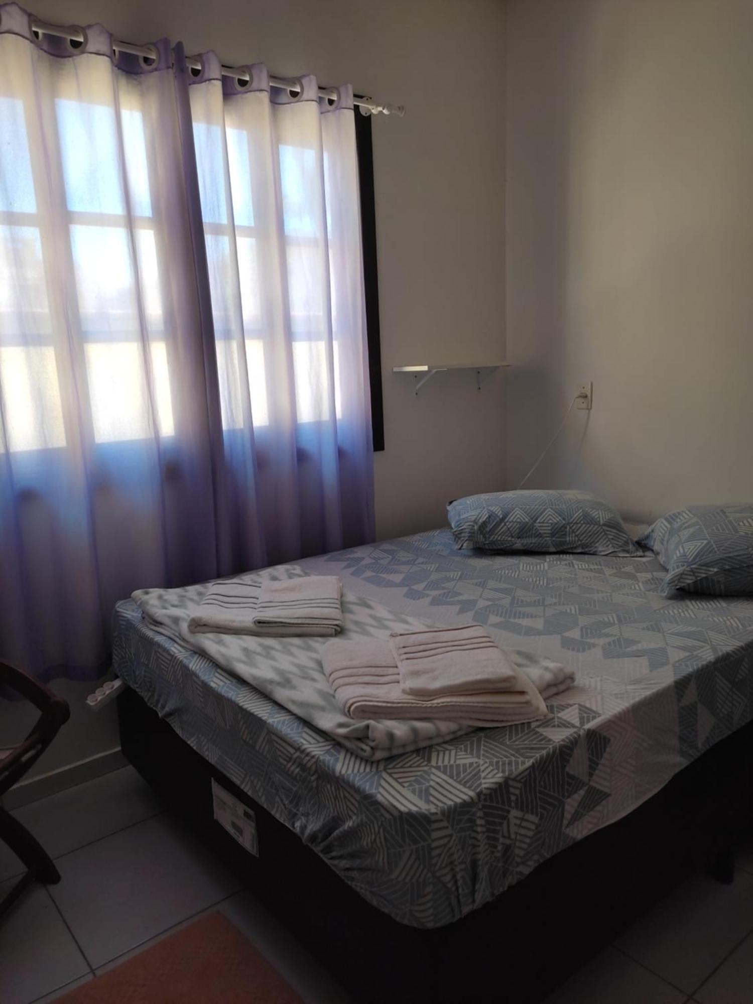 Quarto em casa agradável Pereque Esterno foto