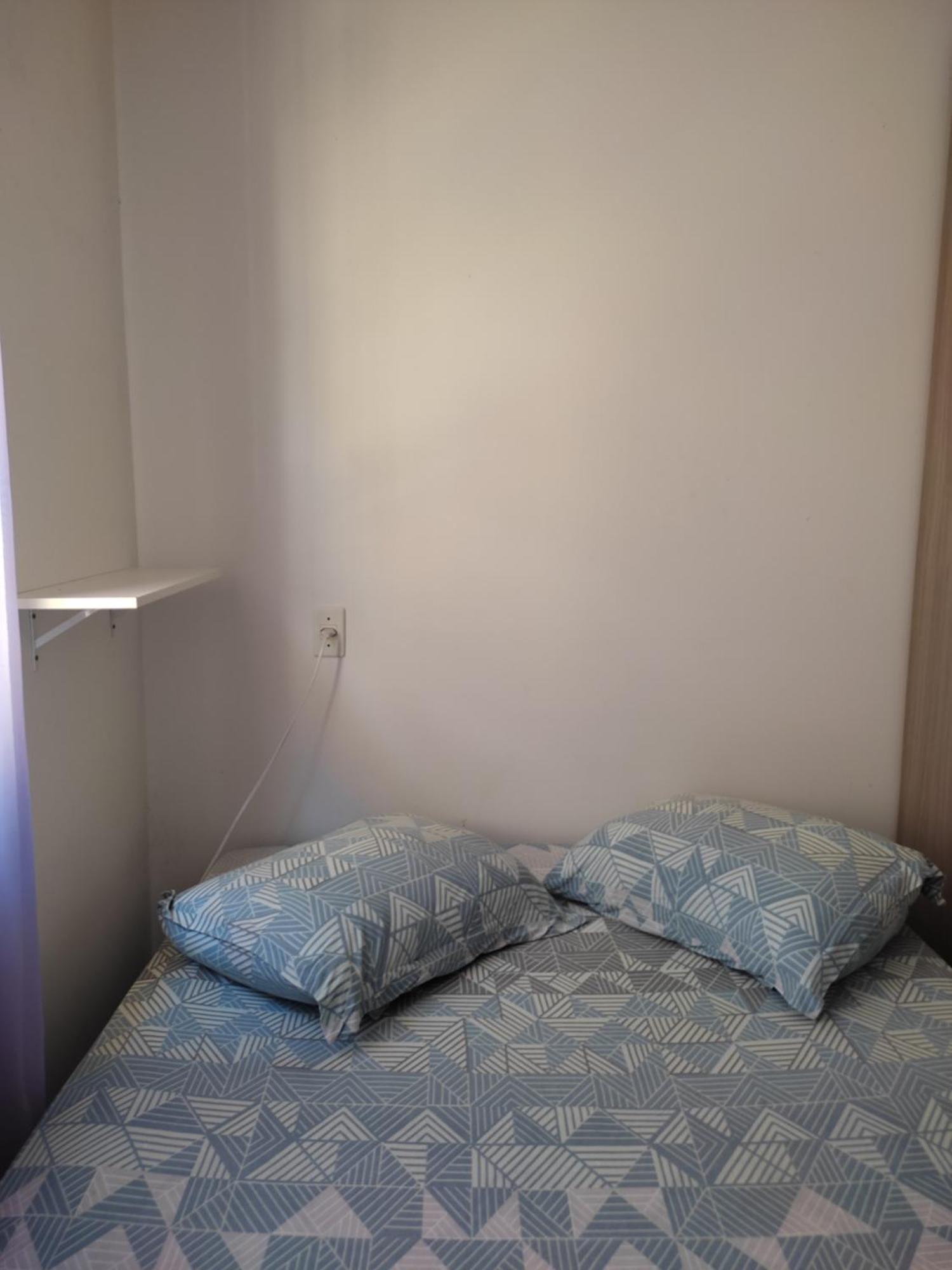 Quarto em casa agradável Pereque Esterno foto